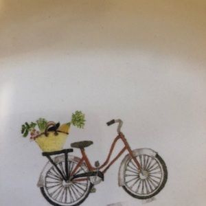 Rae Dunn cup and two oval plates